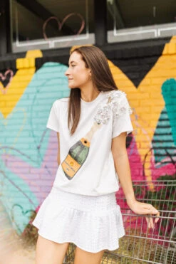 QUEEN OF SPARKLES WHITE CHAMPAGNE TEE